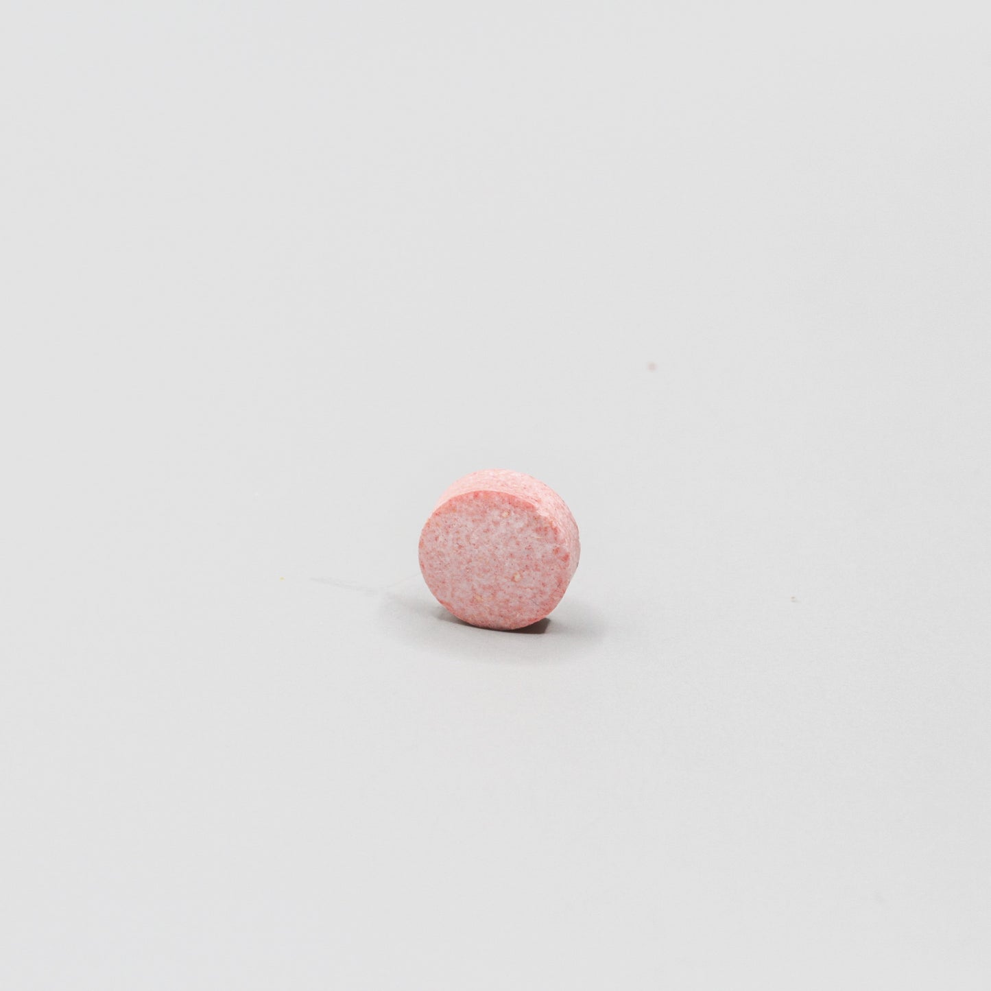 Round reddish pill