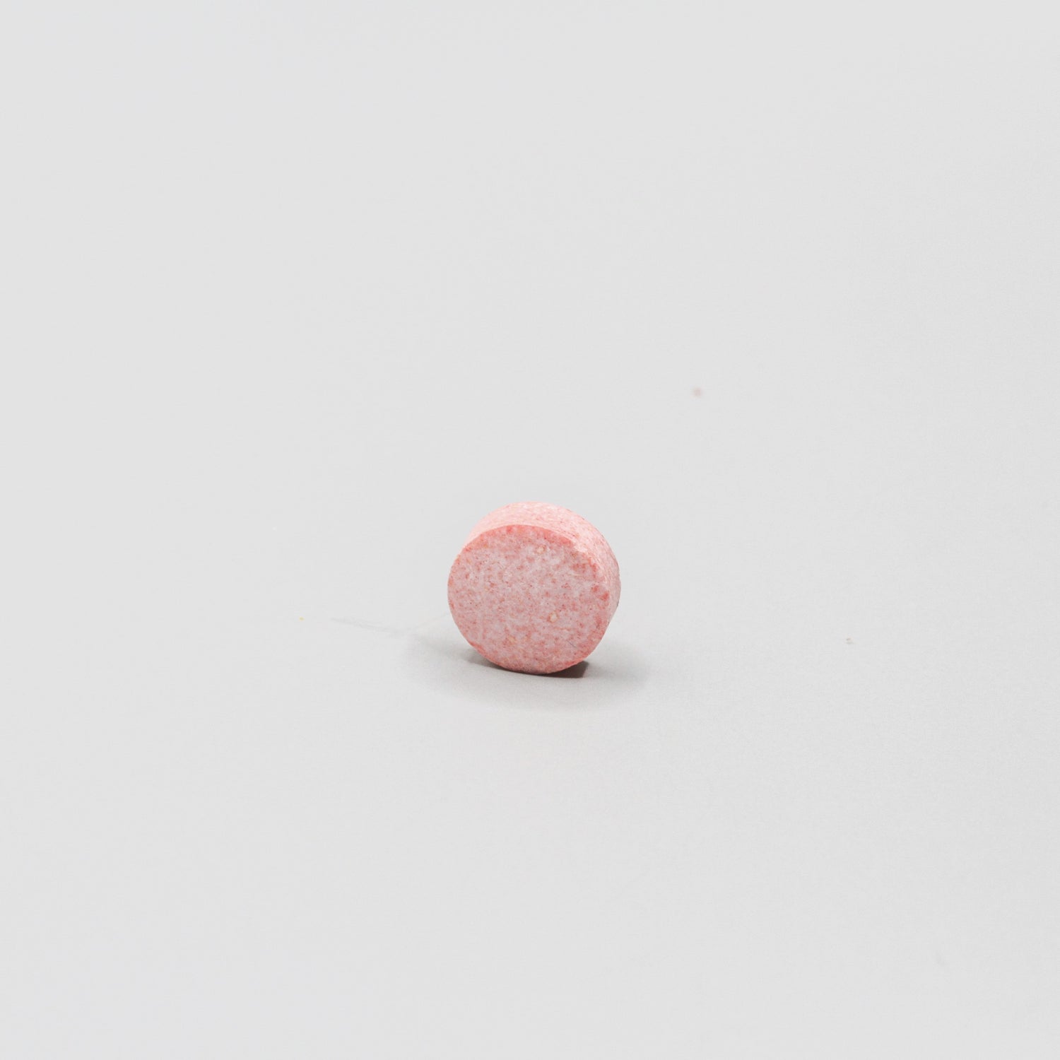 Round reddish pill