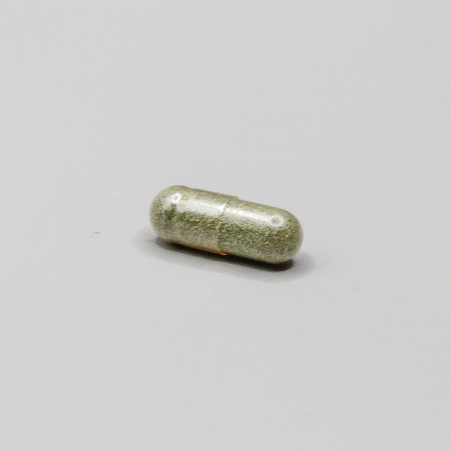 A green pill